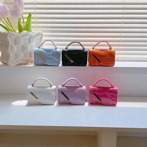 Mini stone pattern crossbody bag in six vibrant colors with chain strap and metal trim