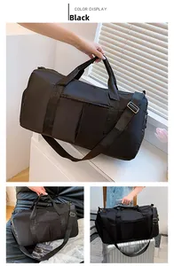 Detail of black waterproof nylon fitness bag with zipper pockets and luggage strap
