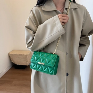 Quilted green leather chain shoulder bag with geometric lattice patterns and gold buckle