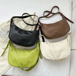 Chic solid color half-moon shoulder bags in a set of four textured leather finishes