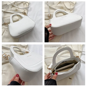 Detailed views showing the white half-moon crossbody bag interior and bottom structure