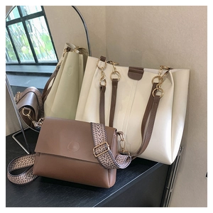 Minimalist beige tote and brown crossbody bag set with decorative jacquard strap