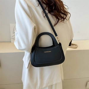 Minimalist black PU leather half-moon crossbody bag with golden FASHION & BAGS lettering
