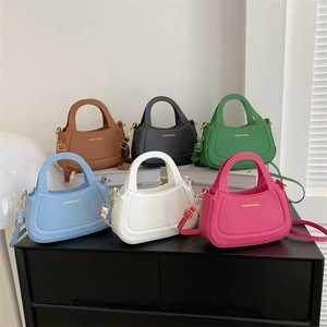 Chic hobo crossbody bag in six colors made of PU leather with gold lettering and top handle
