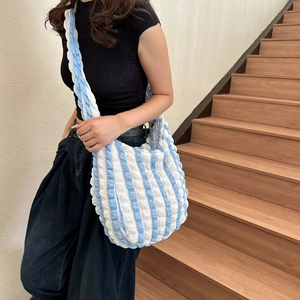 Blue and white striped bubble crossbody bag with soft texture and casual fashion style