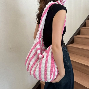 Pink and white striped bubble cloud bag in a minimalist hobo tote style