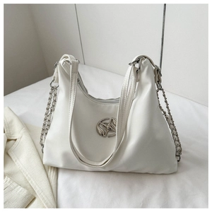 Detail of white PU shoulder bag with silver chain and decorative metal buckle