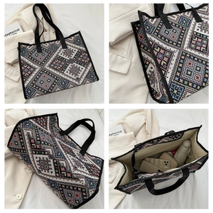 Detailed views of ethnic geometric knit tote bag with durable black handles and large interior