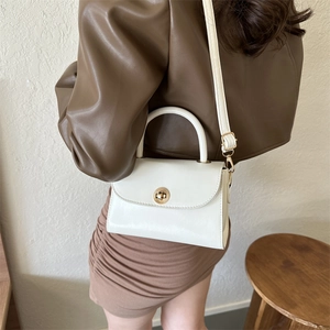 Classic white small square handbag with gold buckle lock and top handle for women