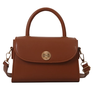 Retro caramel brown PU leather crossbody bag with golden gear buckle and top handle