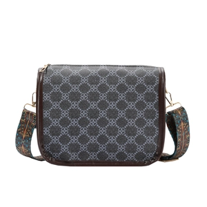 Sac bandoulière gris à motif trèfle avec large sangle rétro et détails dorés