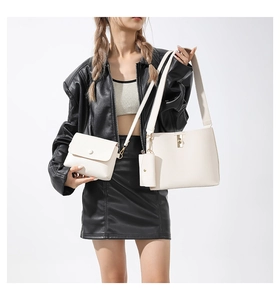 Three-piece beige leather bag set including large tote and small crossbody handbag