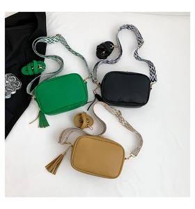 Litchi texture leather square bags with geometric wide straps and tassel charms in three colors