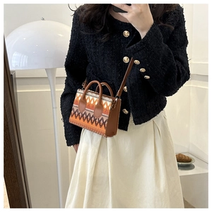 Ethnic bohemian geometric handbag styled with casual indoor outfit for women