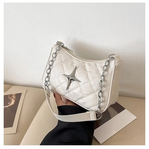 White quilted crossbody bag with silver star emblem and chain strap for women