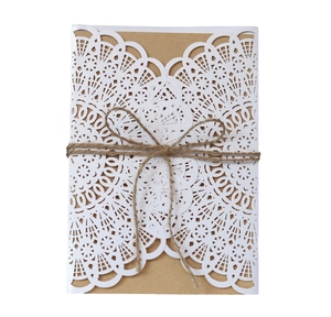 Lace hollow laser-cut wedding invitation with white floral cover and kraft paper insert