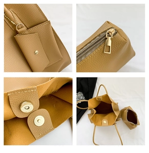 Detail view of lychee texture handbag with magnetic clasp and golden zipper hardware