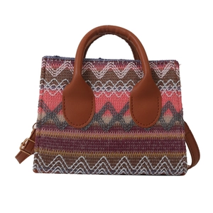 Ethnic boho woven tote bag with zig-zag patterns and brown PU leather straps