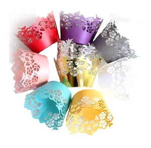 Laser-cut rose and bird cupcake wrappers in various colors for party decoration