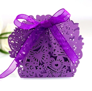 Laser cut heart butterfly favor box in deep purple with organza ribbon for weddings