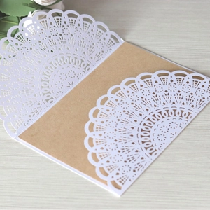 Laser cut lace wedding invitation with white hollow sleeve and kraft paper insert