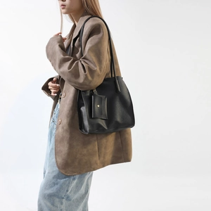 Minimalist black leather tote bag with small pouch pendant for casual women daily commute