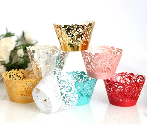 Detailed laser-cut vine patterns on colorful metallic pearl paper cupcake wrappers