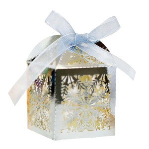 Silver laser-cut snowflake candy box with light blue silk ribbon for Christmas gift