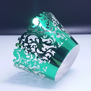 Lace hollow cupcake wrapper with green metallic finish and floral laser cut pattern
