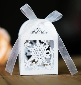 White laser cut snowflake favor box with organza ribbon for wedding and Christmas gifts