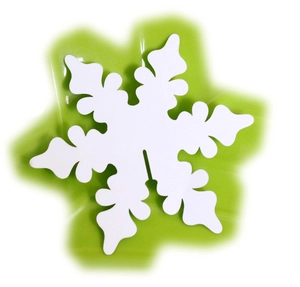 Detail of white laser-cut snowflake place card with bottom slot for glass rim decoration