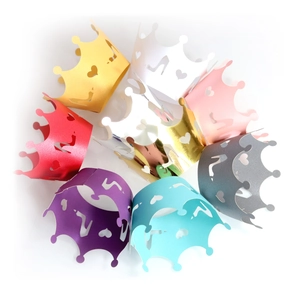Lace-cut crown cupcake wrappers in various metallic colors for party dessert decoration