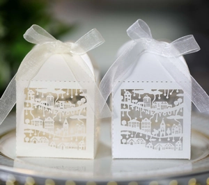 Laser-cut Thank You gift boxes with white organza ribbons and hollow town design