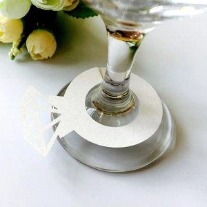 Creative diamond ring shaped wedding place cards in white laser-cut hollow cardstock