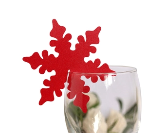 Red snowflake wine glass card with intricate laser cut design for Christmas party decor