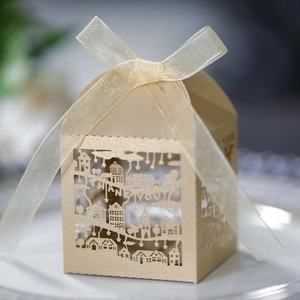 Detailed laser-cut champagne gold gift box with Thank You text and ribbon bow decoration