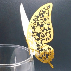 Golden laser-cut butterfly card for wine glass edge decoration at wedding parties