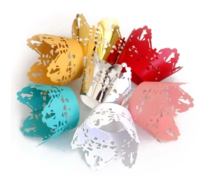 Lace laser cut cupcake wrappers in seven vibrant colors for wedding and party decorations