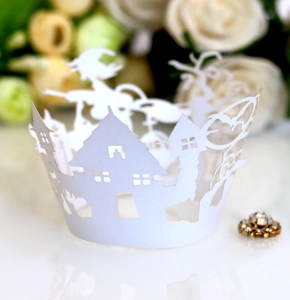 Detailed laser-cut Halloween cupcake wrapper with witch, haunted house, and castle motifs