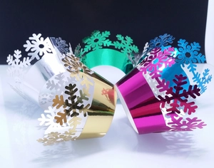 Metallic snowflake hollow cupcake liners in silver, gold, green, rose, and blue colors