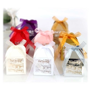 Laser cut Thank You candy boxes in multiple colors with silk ribbons and town patterns