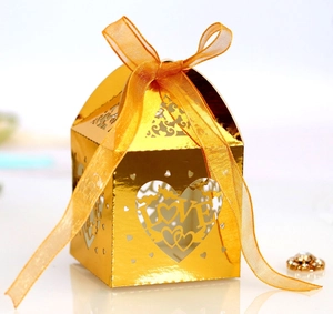 Golden laser cut LOVE heart candy box with silk ribbon and hollow out design