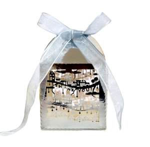 Silver laser-cut city skyline gift box with a Thank You cutout and blue ribbon
