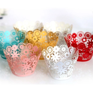 Laser cut floral cupcake wrappers in pink and multi-colors for party decorations