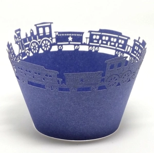Laser cut steam train cupcake wrappers in dark blue pearlescent paper for party