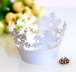 Elegant white snowflake laser cut cupcake wrappers for Christmas holiday party decoration