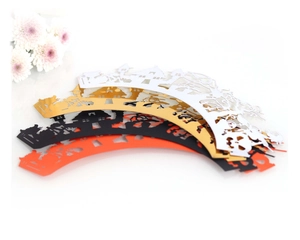 Halloween laser-cut cupcake wrappers featuring witch, castle and bat designs in 4 colors