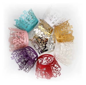 Laser cut floral cupcake wrappers in multiple colors including gold and silver