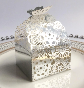 Silver laser-cut hollow gift box with butterfly closure and floral pattern for weddings