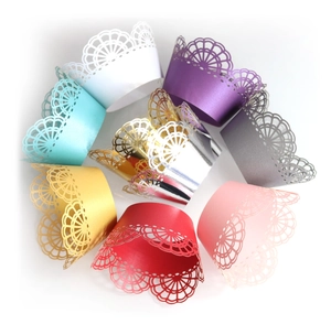 Laser cut Ferris wheel cupcake wrappers in multiple colors for dessert table decoration